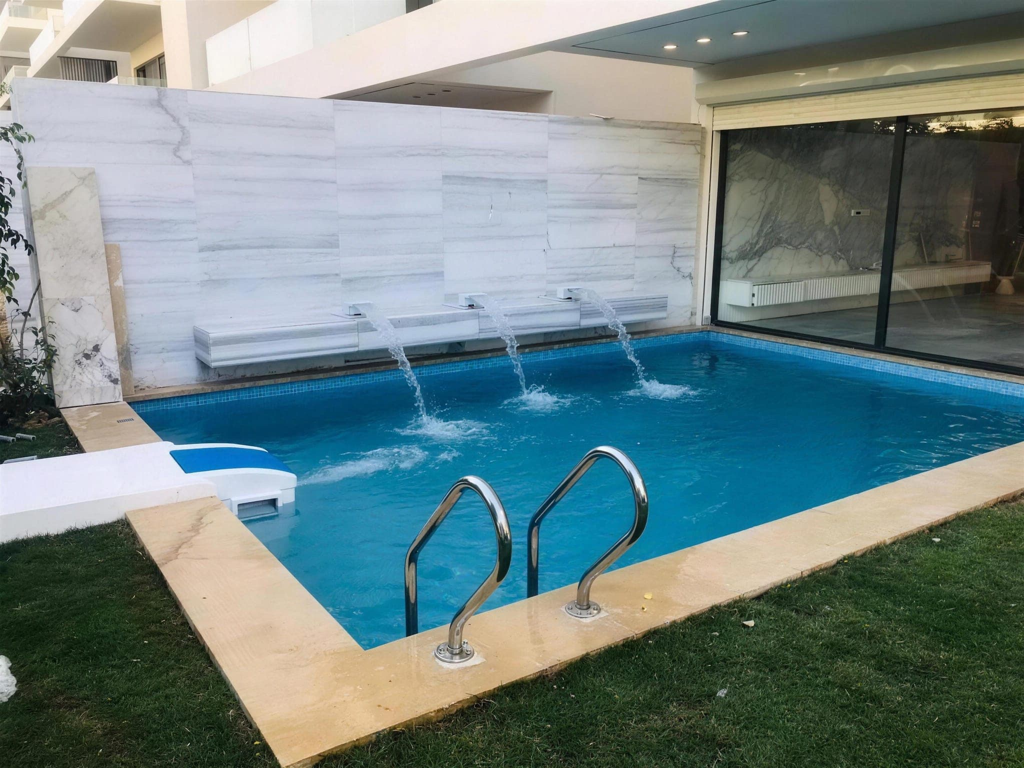 Marble Wall & Water Blades — Villas · Water Features